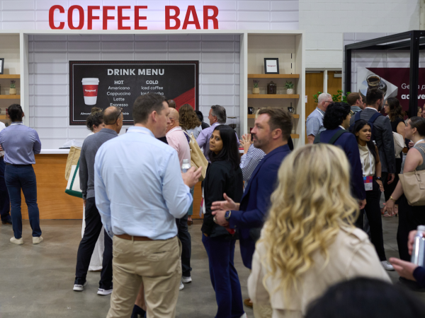 Image of people standing in line for coffee.