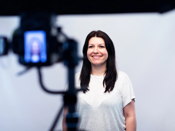 Women standing in front of camera in photo studio