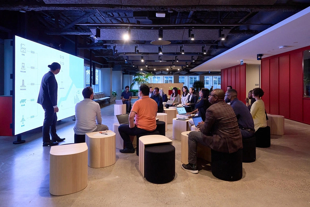 Employees meeting in a conference room at a Morningstar office.