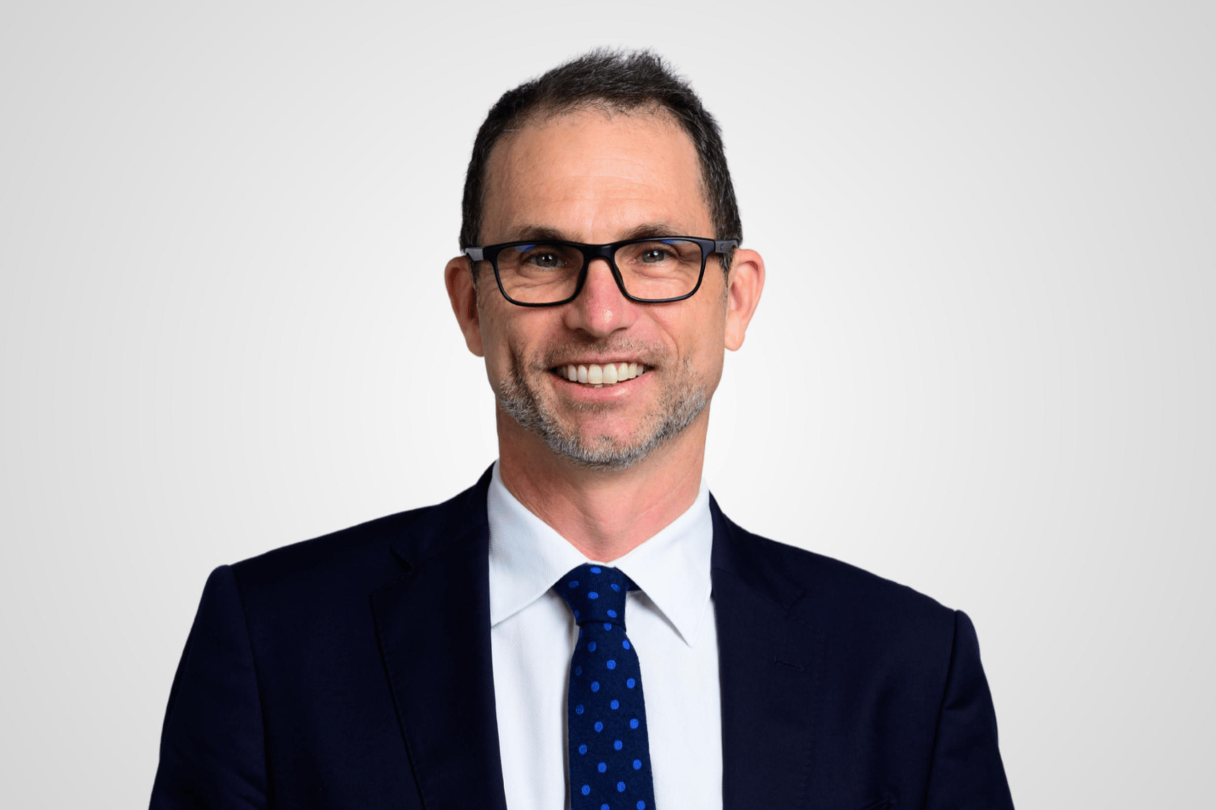 A professional portrait of James Foot