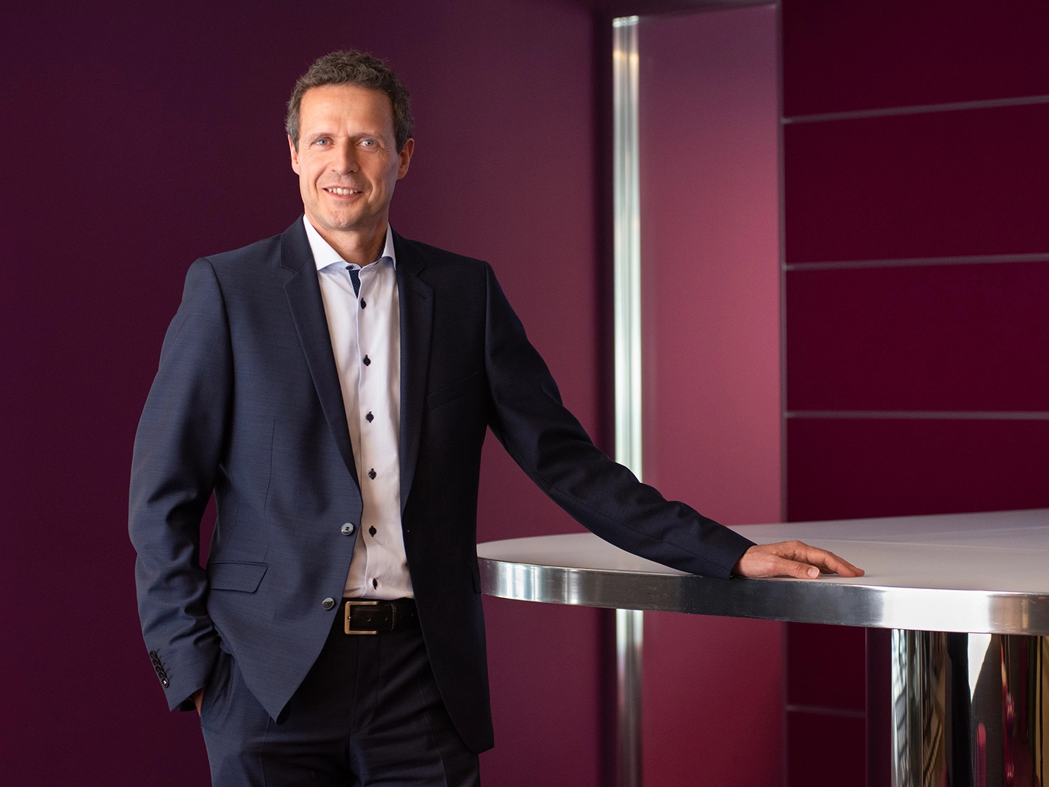 A professional portrait of Detlef Scholz in a Morningstar office.