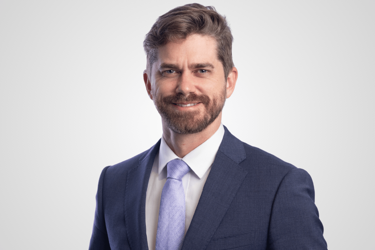 A professional portrait of Joel Grosvenor